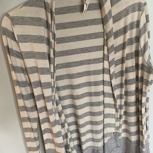 Grey and White sweater.